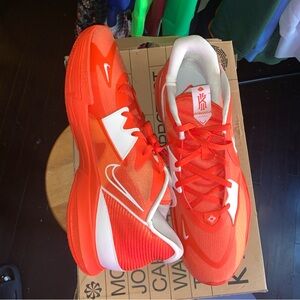 Nike Orange Athletic Shoes with Lightweight Design and Thick Cushioning